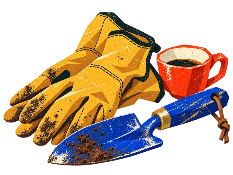 Golden work gloves and a blue trowel resting beside a small red cup.