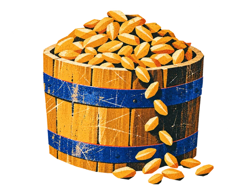 A wooden grain measure with blue bands, filled to the brim with golden grain.